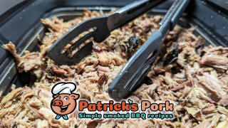 Shredding pulled pork in pan